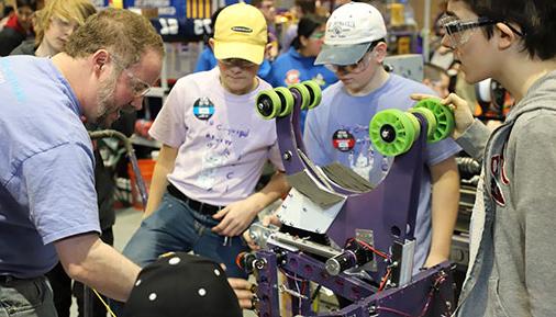 Students from previous FIRST® New York Tech Valley Regional Robotics Competition